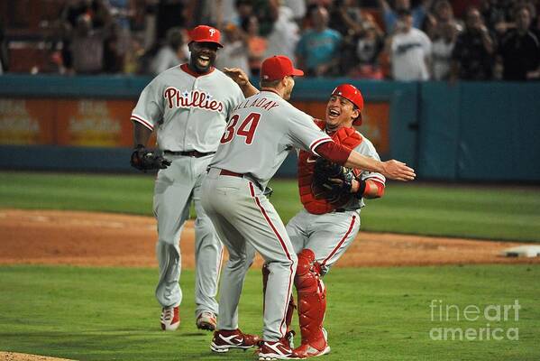 Carlos Ruiz Art Print featuring the photograph Carlos Ruiz, Ryan Howard, and Roy Halladay by Ronald C. Modra