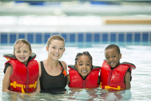 Child Art Print featuring the photograph Children with Their Swim Instructor by FatCamera