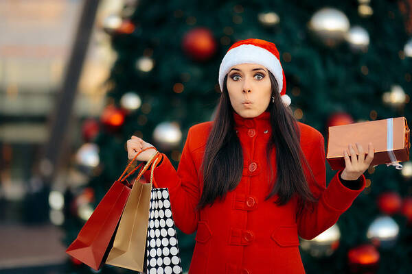 Confusion Art Print featuring the photograph Christmas Shopping Girl with Bags and Gift Box by Nicoletaionescu