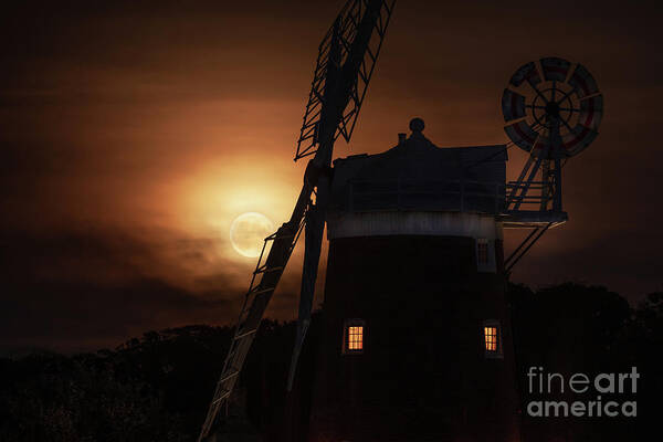 Cley Art Print featuring the photograph Cley windmill and harvest moon at night in Norfolk by Simon Bratt