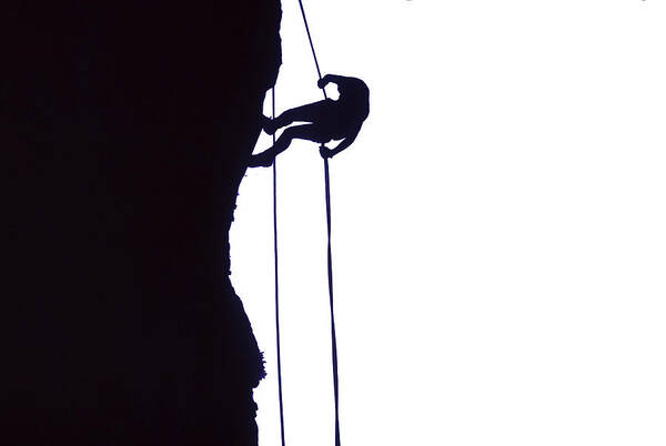 Abseil Art Print featuring the photograph Climber on rappel by Steve Estvanik