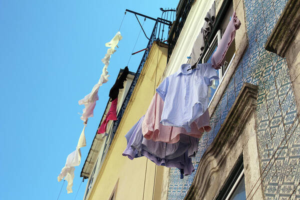 Hanging Art Print featuring the photograph Clothes hanging by Fabiano Di Paolo