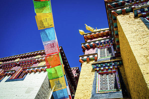 Outdoor Art Print featuring the photograph Colorful Tibetan monastery with prayer flags spreading good fortune by Adelaide Lin