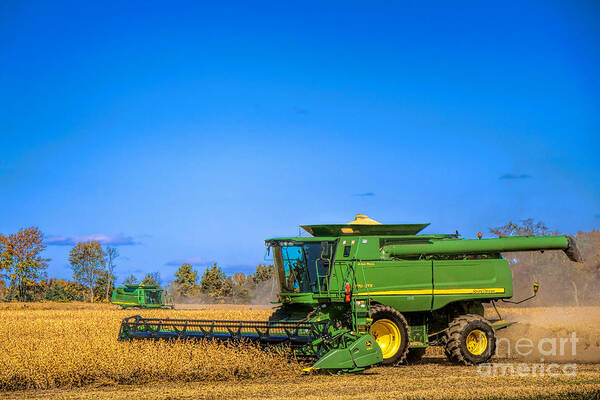 Harvester Art Print featuring the photograph Combine Harvesting a Field by Olivier Le Queinec