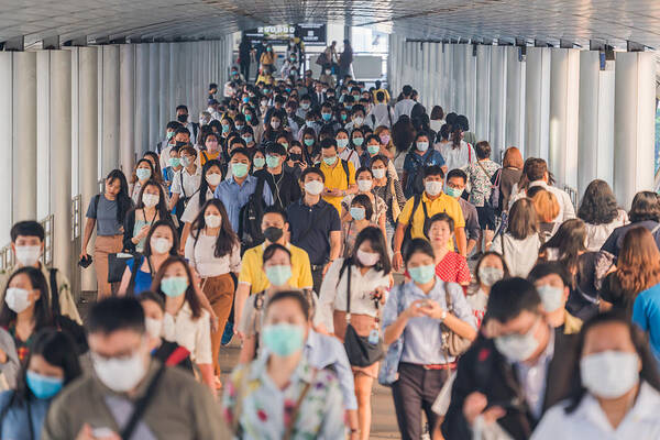 Cold And Flu Art Print featuring the photograph Crowds of Asian people wearing face protection while going to their workplace in Bangkok at morning rush hour by MR.Cole_Photographer