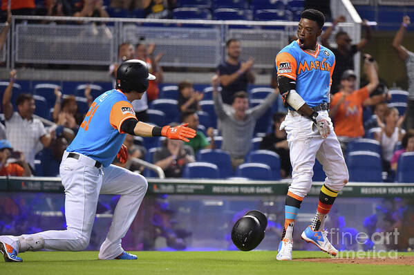 People Art Print featuring the photograph Dee Gordon and Christian Yelich by Eric Espada