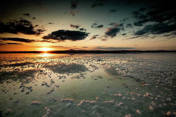Sunset Art Print featuring the photograph Dramatic winter sunset in the lake. by Michalakis Ppalis