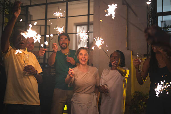 2019 Art Print featuring the photograph Family and Friends Celebrating New Year Party with Sparkler at Home by FG Trade