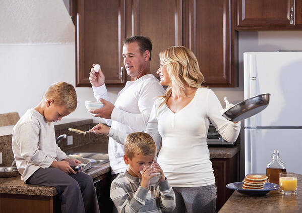 White People Art Print featuring the photograph Family in kitchen making breakfast by Kali9