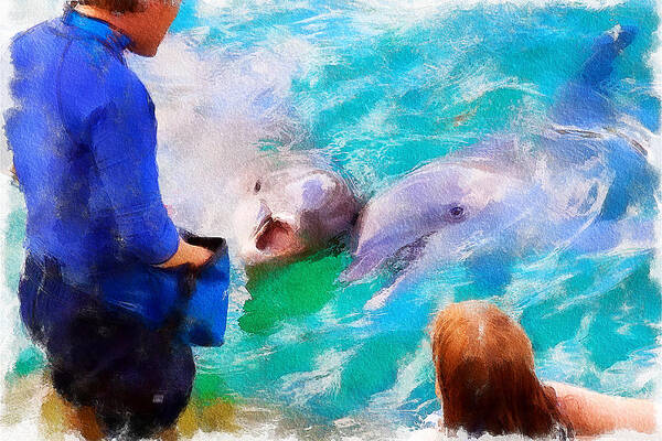 Feeding the dolphins at Xcaret Ecological Park, Mexico