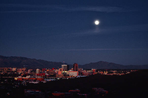 Tucson Art Print featuring the photograph Full moon rises over downtown Tucson, Arizona by Chance Kafka