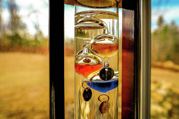 Galileo Thermometer Art Print featuring the photograph Galileo Thermometer In The Window, by Jeff Sinon