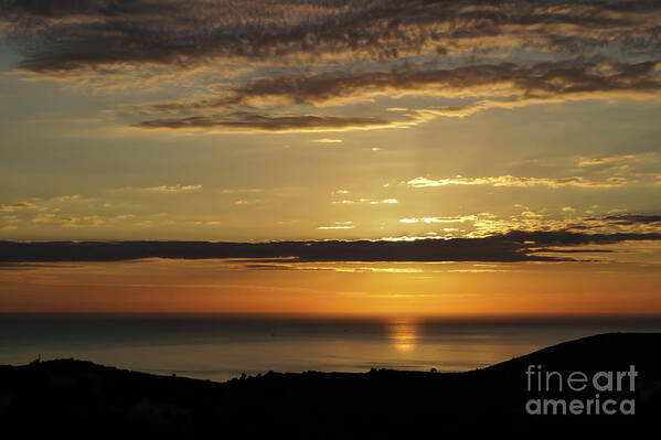 Clouds Art Print featuring the photograph Golden sunrise over the sea by Adriana Mueller