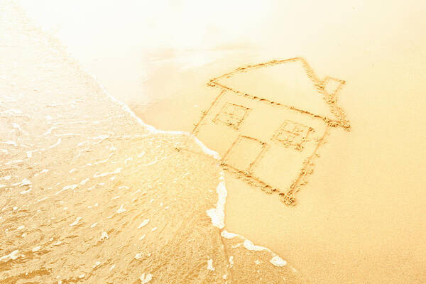 Problems Art Print featuring the photograph House in sand washed away by waves by Dan Brownsword