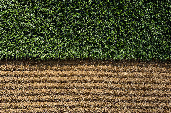 Grass Art Print featuring the photograph Manicured Sports Field between turf and dirt by Cmannphoto