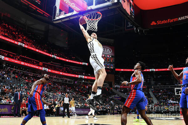 Miles Plumlee Art Print featuring the photograph Mason Plumlee and Miles Plumlee by Scott Cunningham