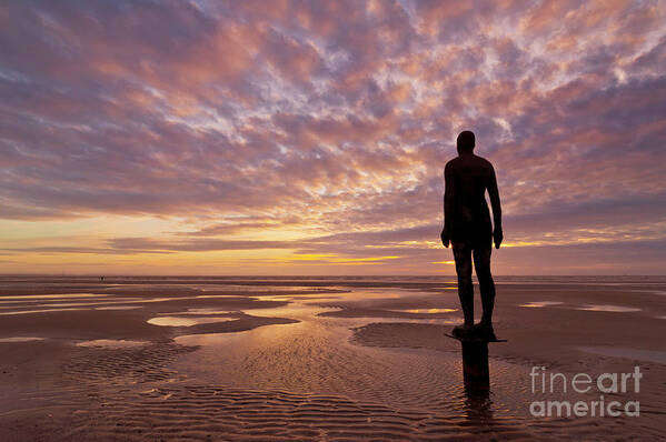 Another Place Art Print featuring the photograph Metal statues on Crosby beach, Merseyside, England by Neale And Judith Clark