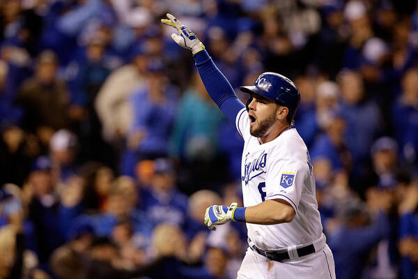 Celebration Art Print featuring the photograph Mike Moustakas by Ezra Shaw