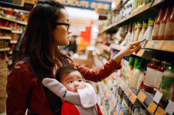Mid Adult Art Print featuring the photograph Mother and baby boy at supermarket by images by Tang Ming Tung