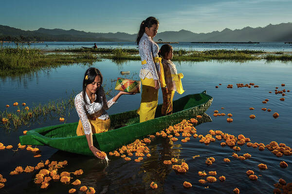 Asia Art Print featuring the photograph Offerings on lake Batur by young Balinese girls in the early morning by Anges Van der Logt