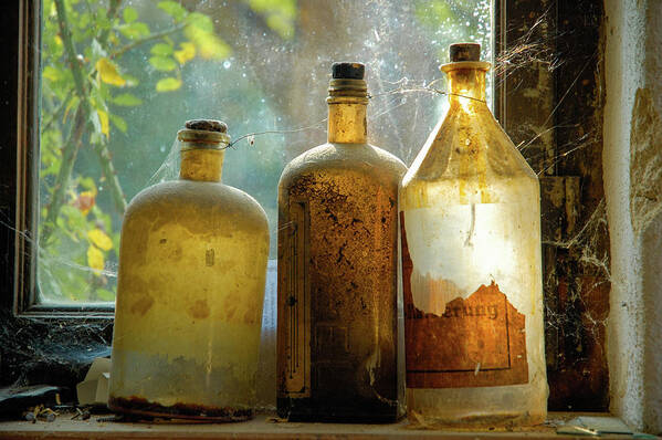 Bottles Art Print featuring the photograph Old and dusty glass bottles by Matthias Hauser
