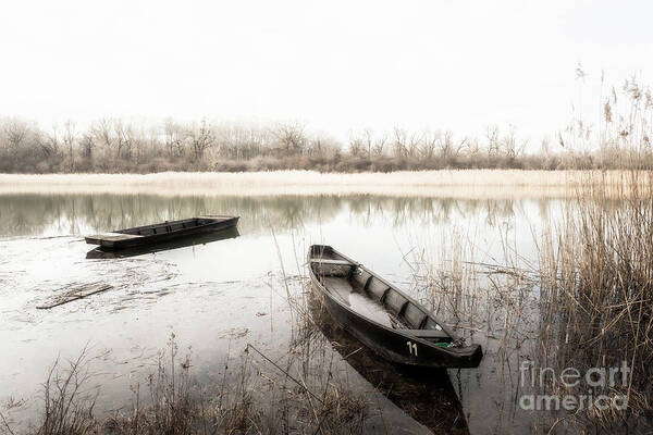 Abandoned Art Print featuring the photograph Old Wooden Boats Anchored In Calm Mystic Lake by Andreas Berthold