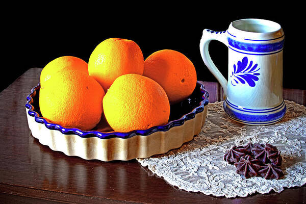 Still Life Art Print featuring the photograph Oranges and Chocolate by Ira Marcus