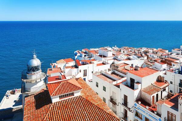 Spain Art Print featuring the photograph Peniscola Castle lighthouse by Songquan Deng