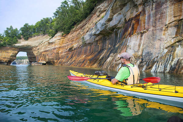 Pictured Rocks National Lakeshore Art Print featuring the photograph Pictured Rocks Kayaker Arch 2 by Genesisgraphics