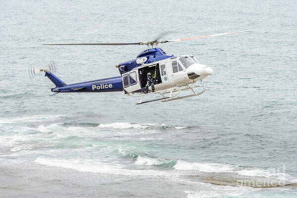 Ocean Art Print featuring the photograph Police Chopper Mission by Werner Padarin