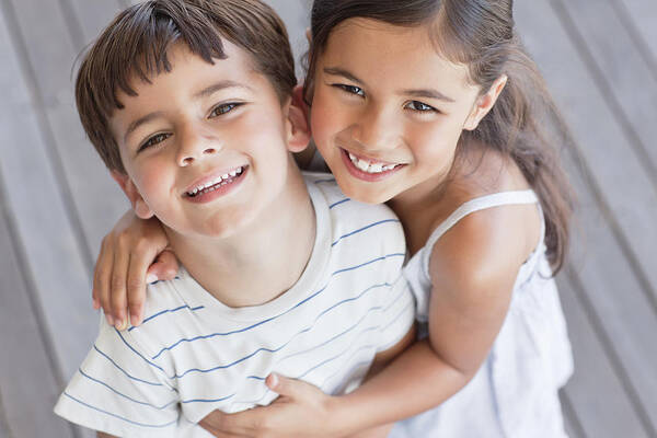 4-5 Years Art Print featuring the photograph Portrait of brother and sister smiling by OJO Images