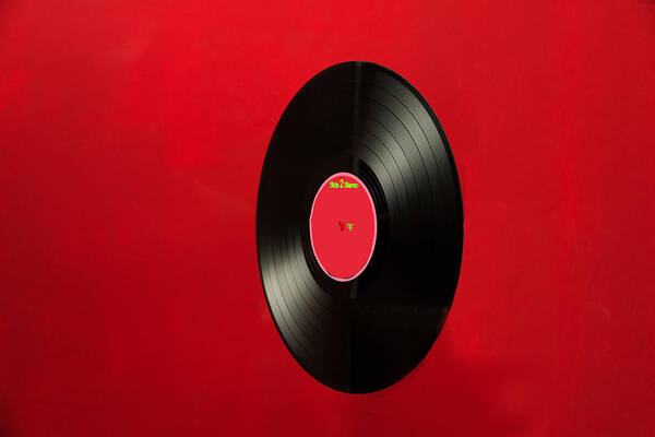 Optical Disk Art Print featuring the photograph Record against red background by Christina Reichl Photography