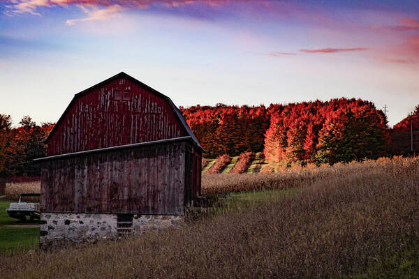 Michigan Fall Art Print featuring the photograph Red barn at sunrise with fall colors in northern Michigan by Eldon McGraw