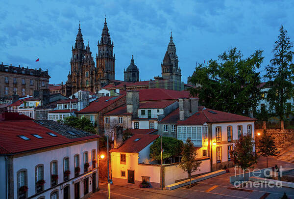 Way Art Print featuring the photograph Santiago de Compostela Cathedral Spectacular View by Night Dusk with Street Lights and Tiled Roofs La Corua Galicia by Pablo Avanzini