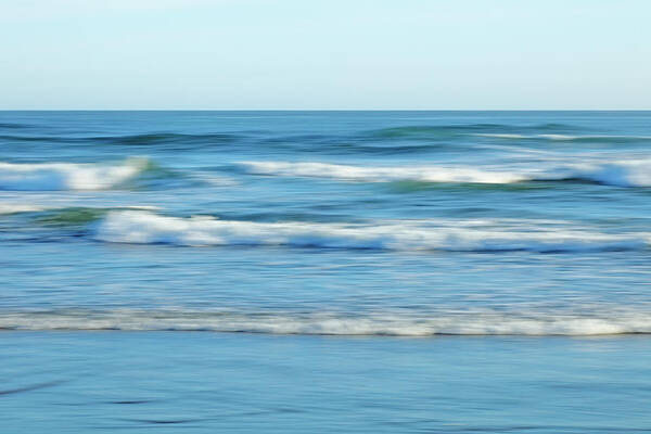 Scenics Art Print featuring the photograph soft waves on a Pacific beach by Rainer Grosskopf