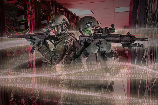 Toughness Art Print featuring the photograph Soldiers holding guns in server room by Jon Feingersh Photography Inc