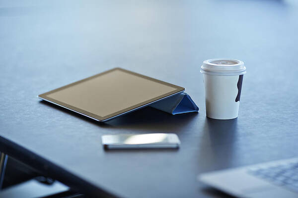 Office Art Print featuring the photograph Still-life of tablet, to-go coffee & phone by Klaus Vedfelt