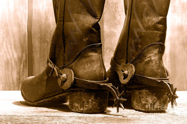 Cowboy Art Print featuring the photograph The Muddy Boots - Sepia by Olivier Le Queinec