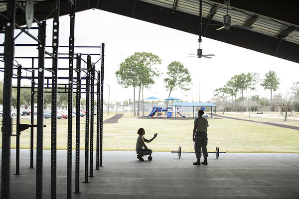 Working Art Print featuring the photograph Two female soldiers barbell training at military air force base by Sean Murphy