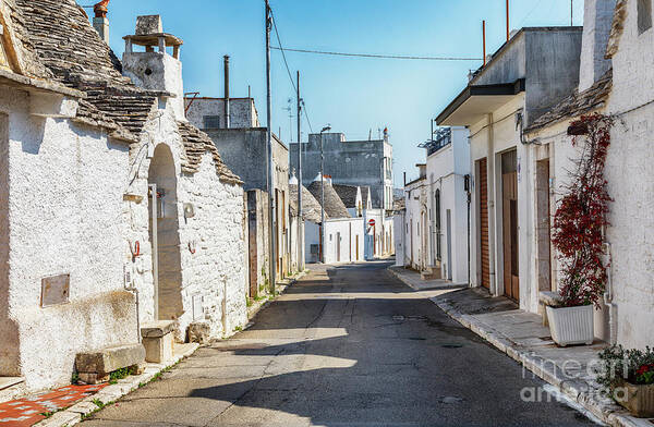 Italy Art Print featuring the photograph village Alberobello with gabled roofs, Puglia, Italy by Ariadna De Raadt