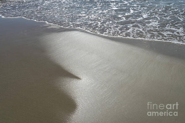 Sandy Beach Art Print featuring the photograph Wet sand, sea water and reflections of sunlight by Adriana Mueller