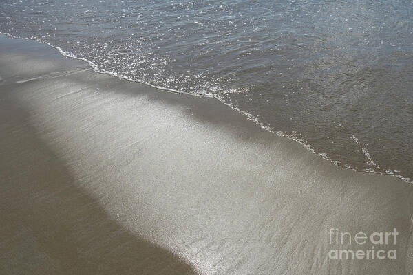 Sandy Beach Art Print featuring the photograph Wet sand, sea water and reflections of sunlight 2 by Adriana Mueller