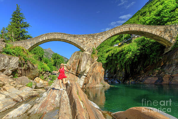 Switzerland Art Print featuring the photograph woman running at Ponte dei Salti Bridge by Benny Marty