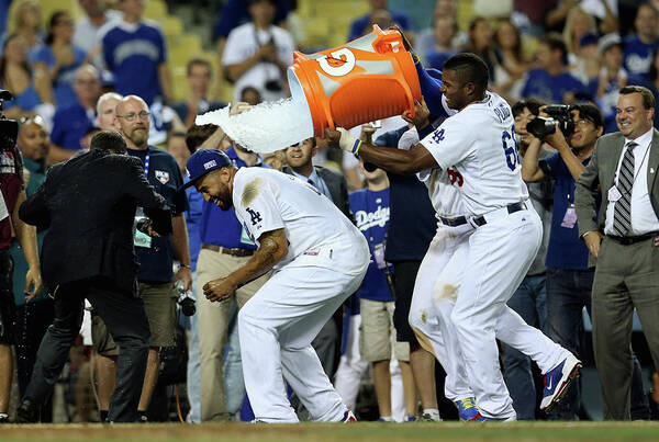 Game Two Art Print featuring the photograph Yasiel Puig and Matt Kemp by Stephen Dunn