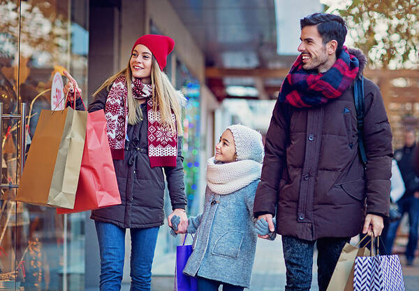 Bulgaria Art Print featuring the photograph Young couple is shopping at Christmas by Praetorianphoto