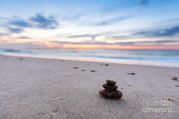 Zen Art Print featuring the photograph Zen stones on calm beach at sunset by Michal Bednarek