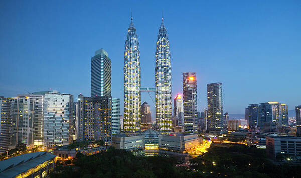 Corporate Business Art Print featuring the photograph Petronas Twin Towers And Kuala Lumpar by Travelpix Ltd