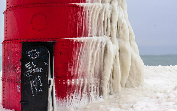 South Haven Lighthouse Art Print featuring the photograph South Haven Lighthouse door Frozen by Joe Holley