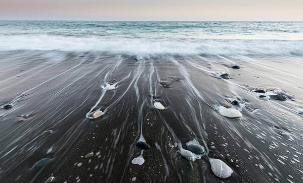 Seascape Art Print featuring the photograph Pebbles in the beach and flowing sea water by Michalakis Ppalis