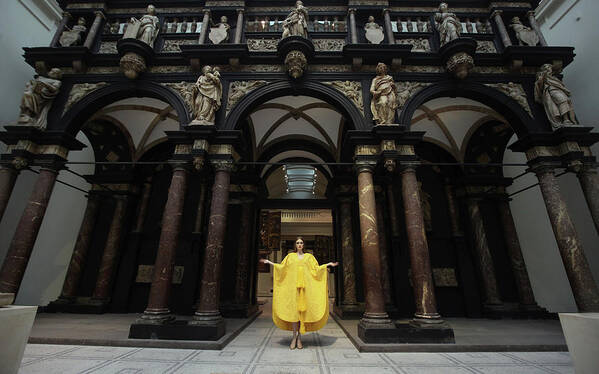 England Art Print featuring the photograph A Golden Spider Silk Cape Is Unveiled by Oli Scarff